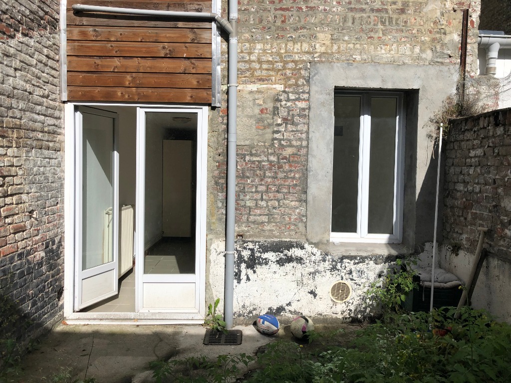 Appartement type 2 avec jardin Photo 2 - JLW Immobilier