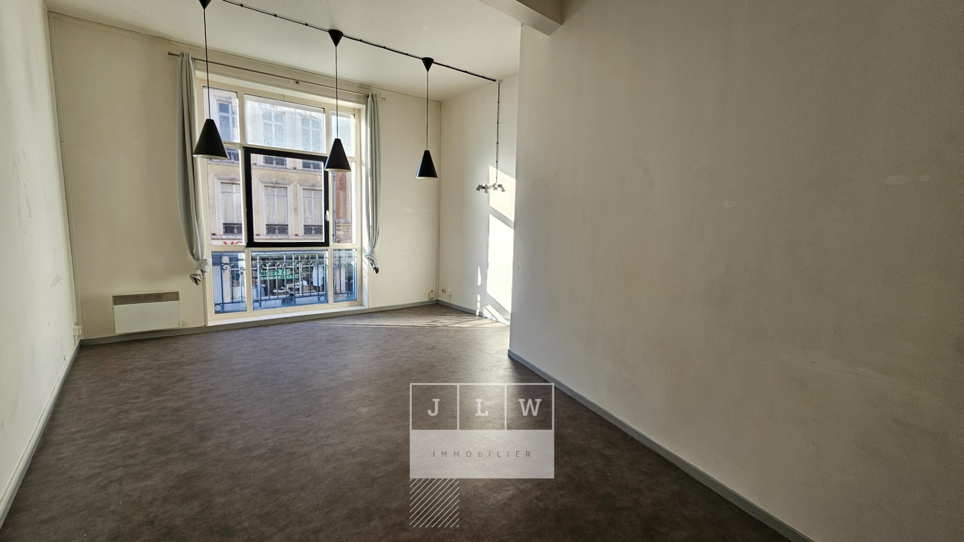 Tca pa jlwloc studio 3491m non meuble proche grand place Photo 1 - JLW Immobilier