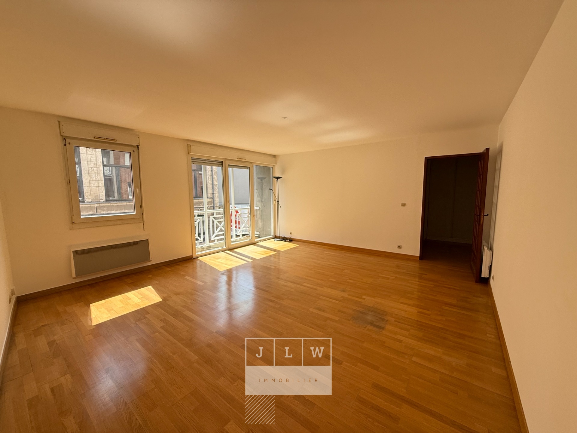 T3 avec garage balcon et cave Photo 1 - JLW Immobilier