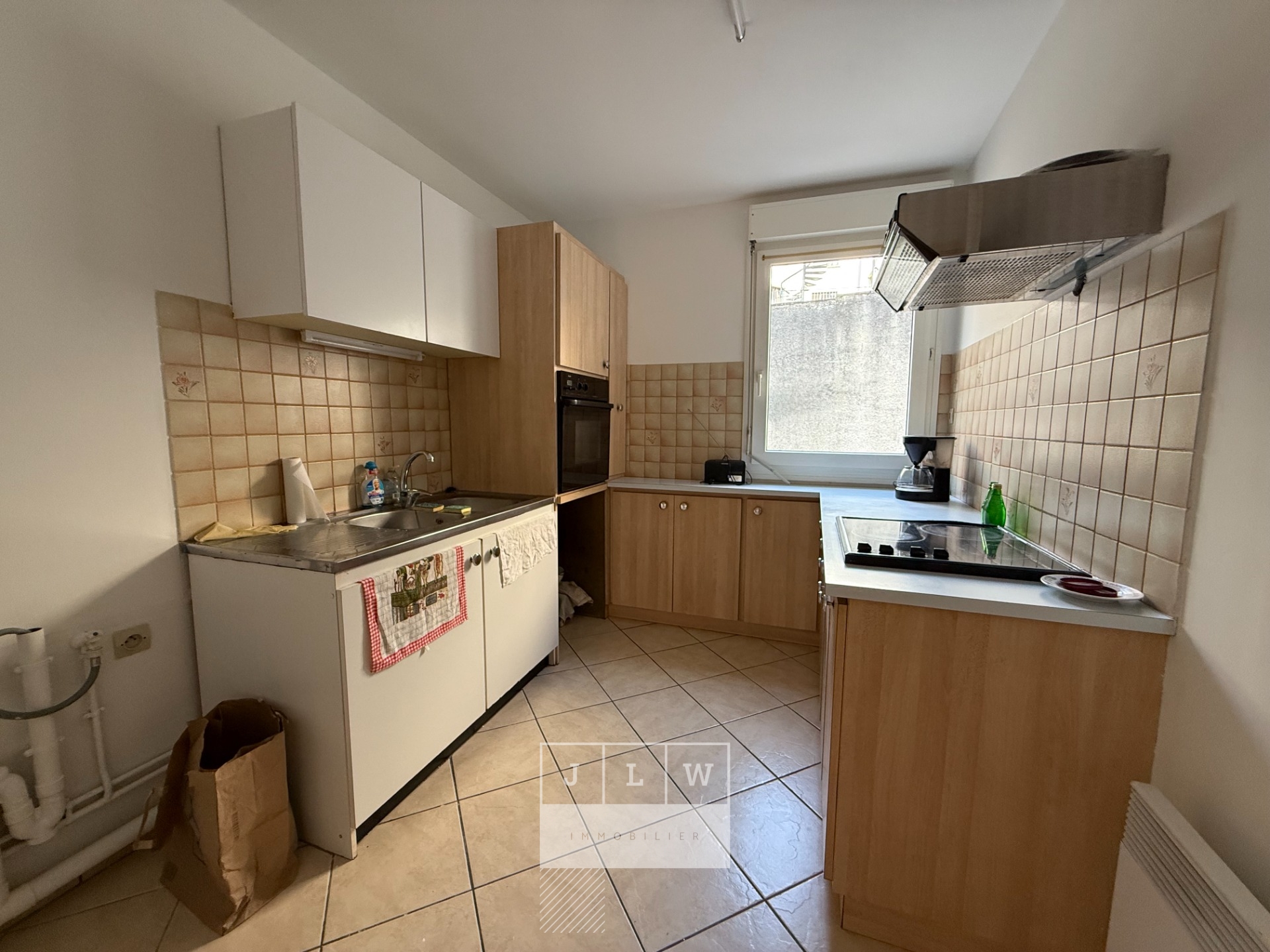 T3 avec garage balcon et cave Photo 3 - JLW Immobilier