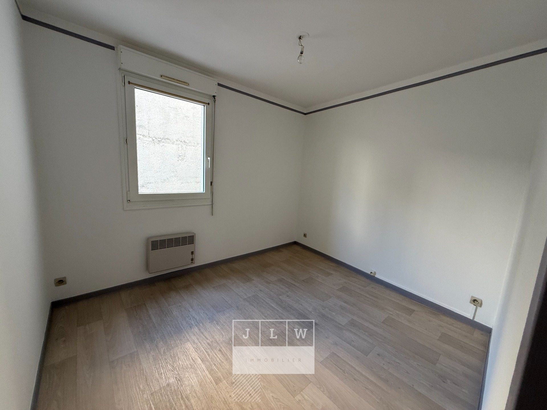 T3 avec garage balcon et cave Photo 4 - JLW Immobilier