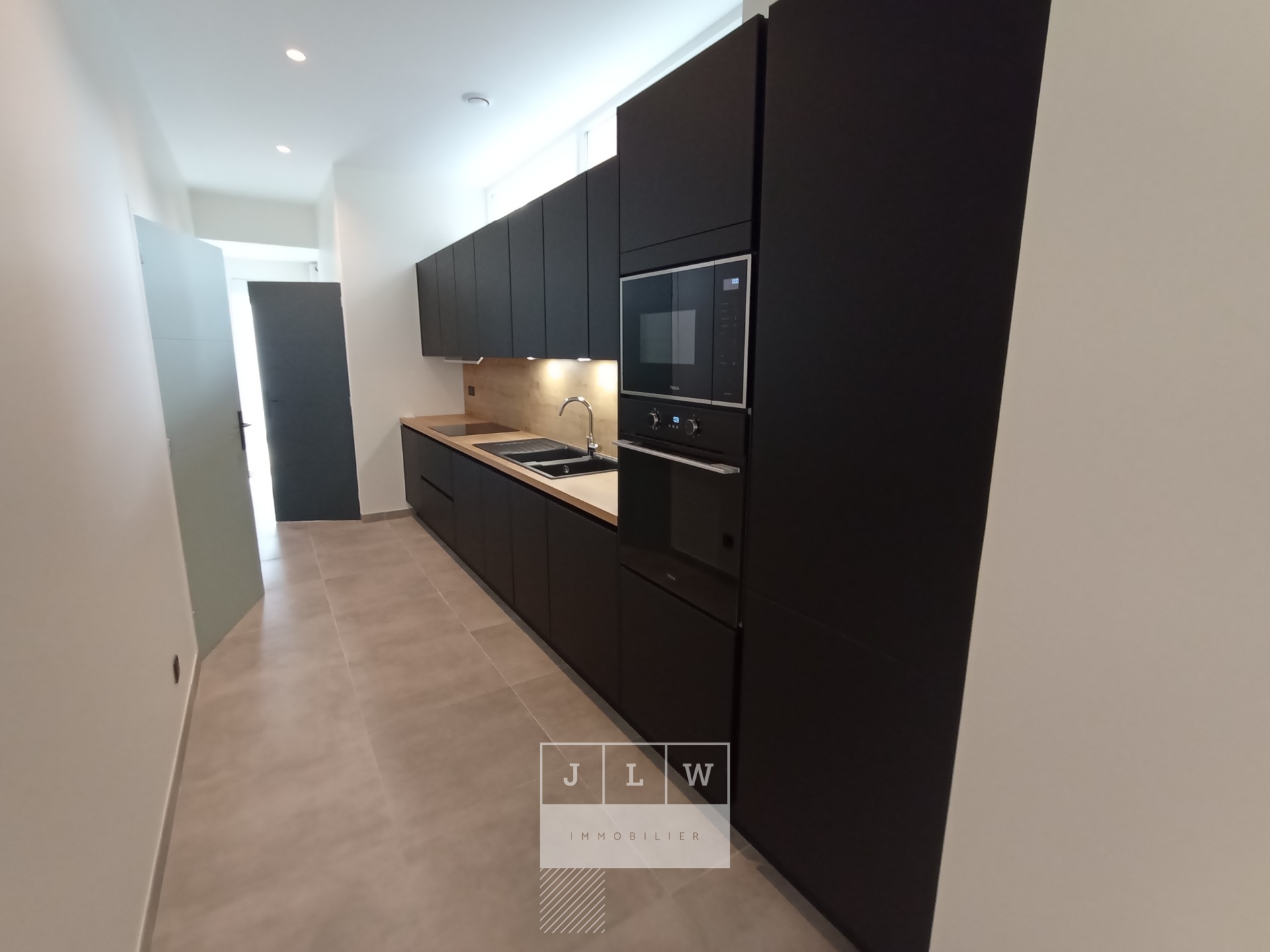 Akmb ll152 appartement type 3 en rdc 2 exterieurs Photo 3 - JLW Immobilier Akmb ll152 appartement type 3 en rdc 2 exterieurs Photo 3 - JLW Immobilier