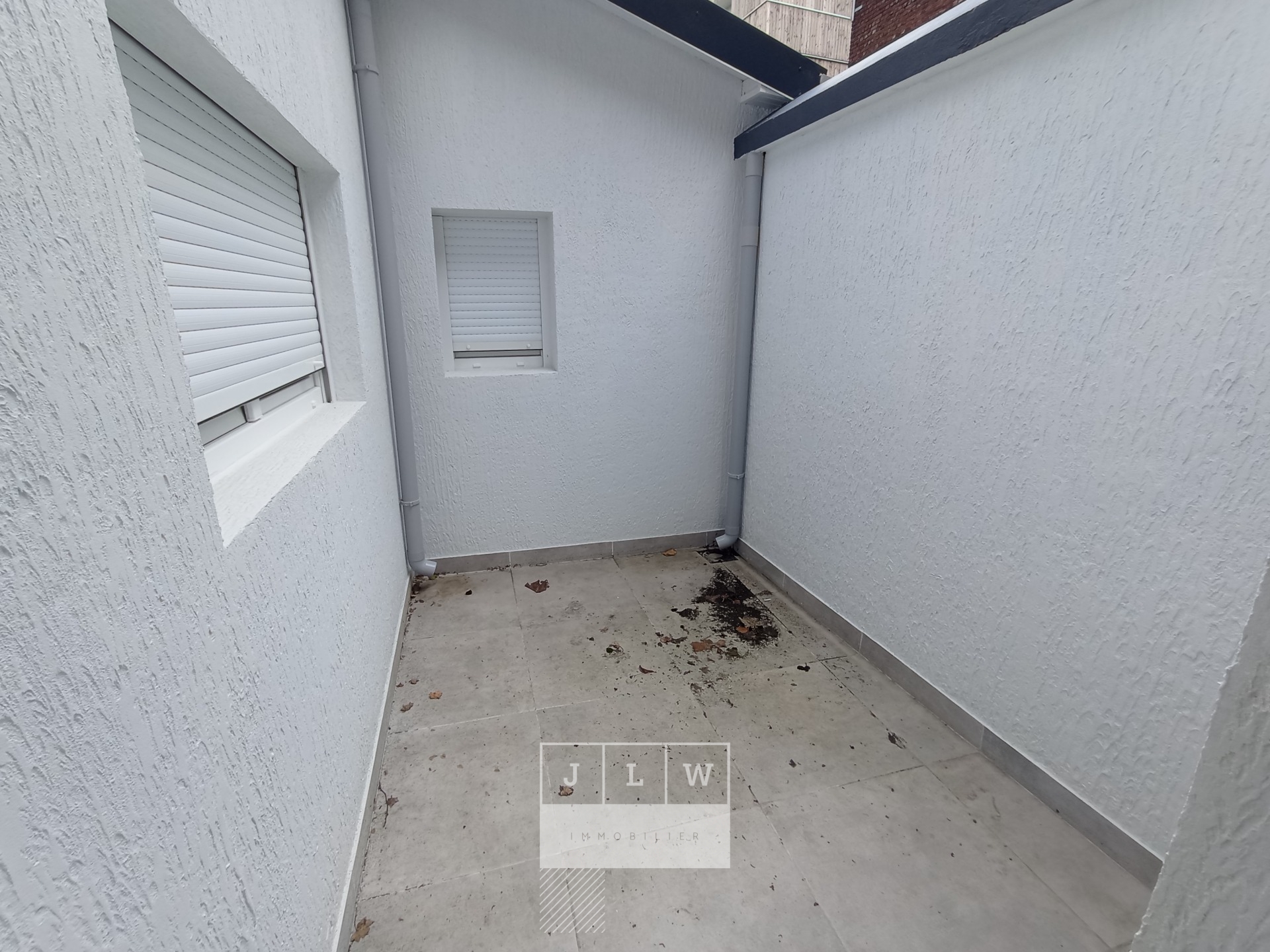 Akmb ll152 appartement type 3 en rdc 2 exterieurs Photo 8 - JLW Immobilier Akmb ll152 appartement type 3 en rdc 2 exterieurs Photo 8 - JLW Immobilier