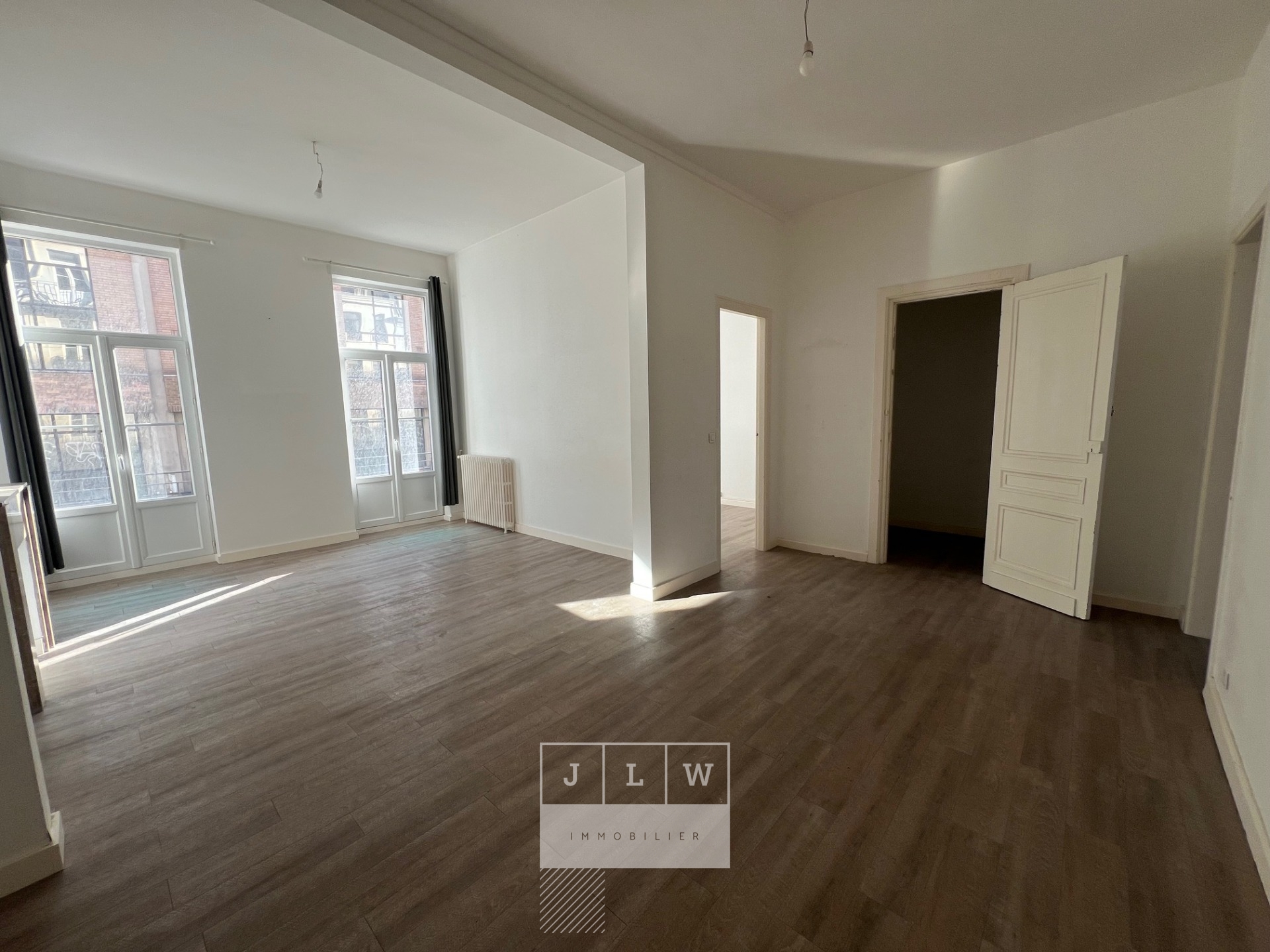 T4 gambetta avec balcon Photo 1 - JLW Immobilier