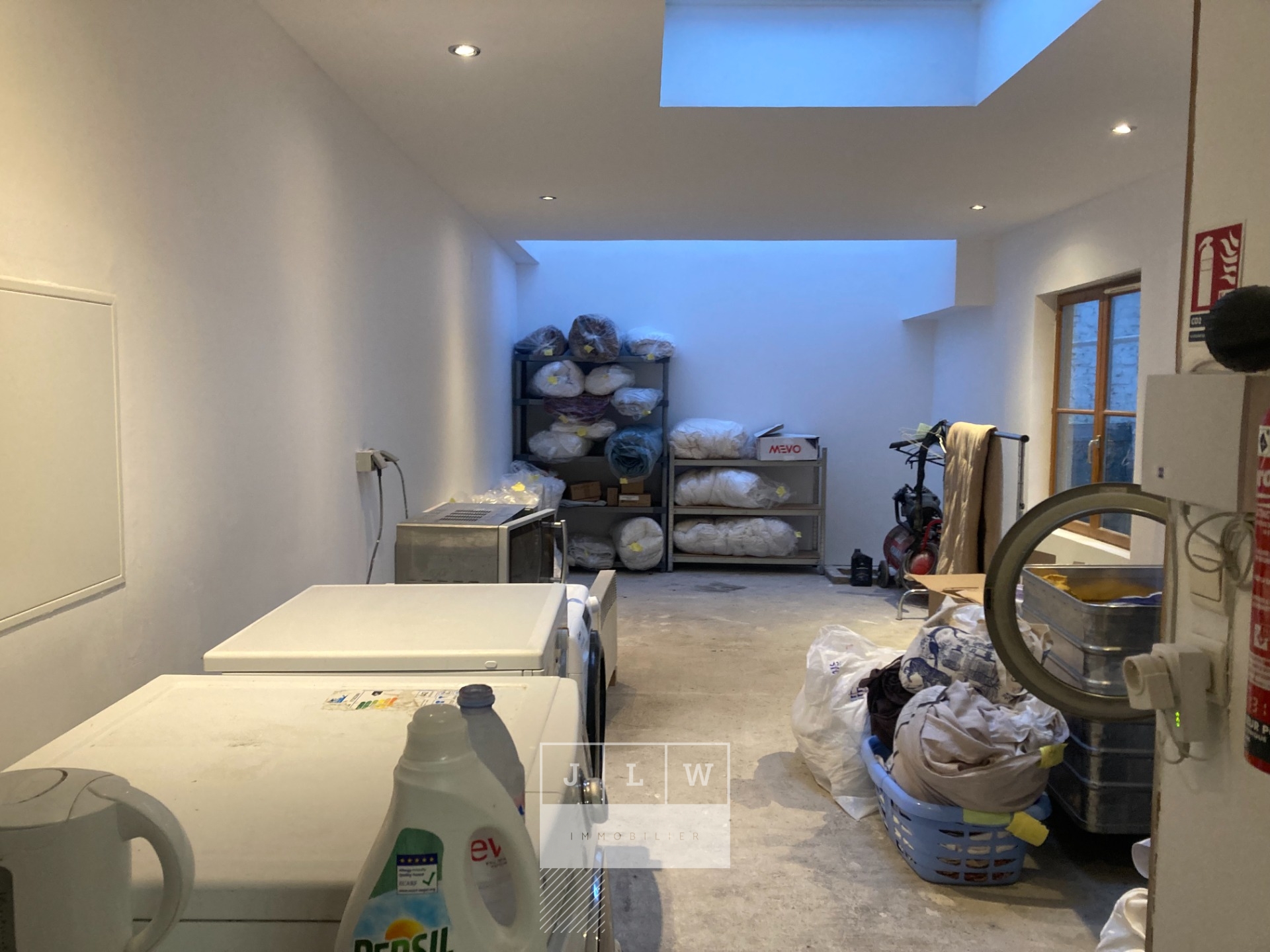 Aoxe cession fonds de commerce activite pressing Photo 1 - JLW Immobilier