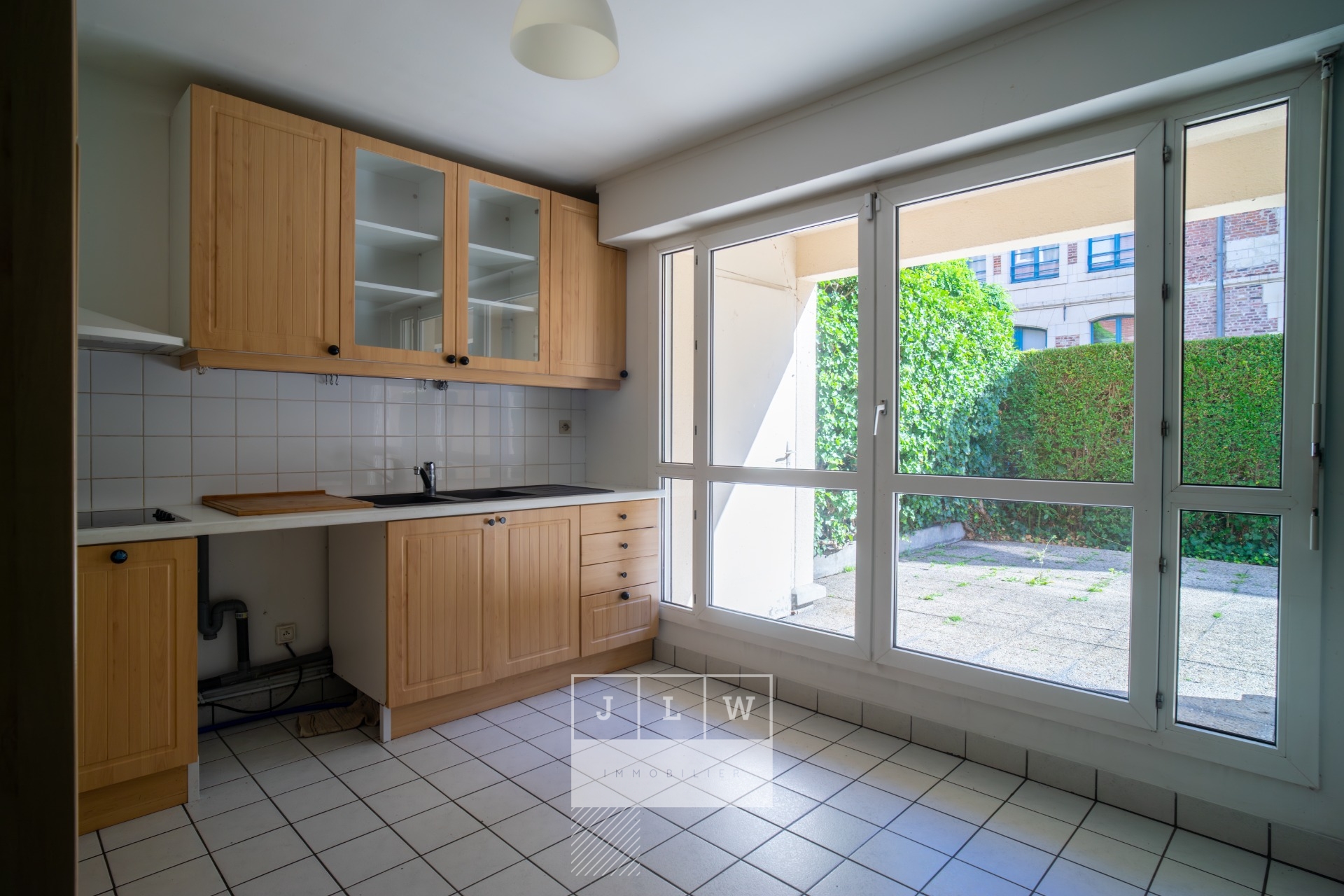 Vieux lille appartement t4 avec jardin et garage Photo 2 - JLW Immobilier