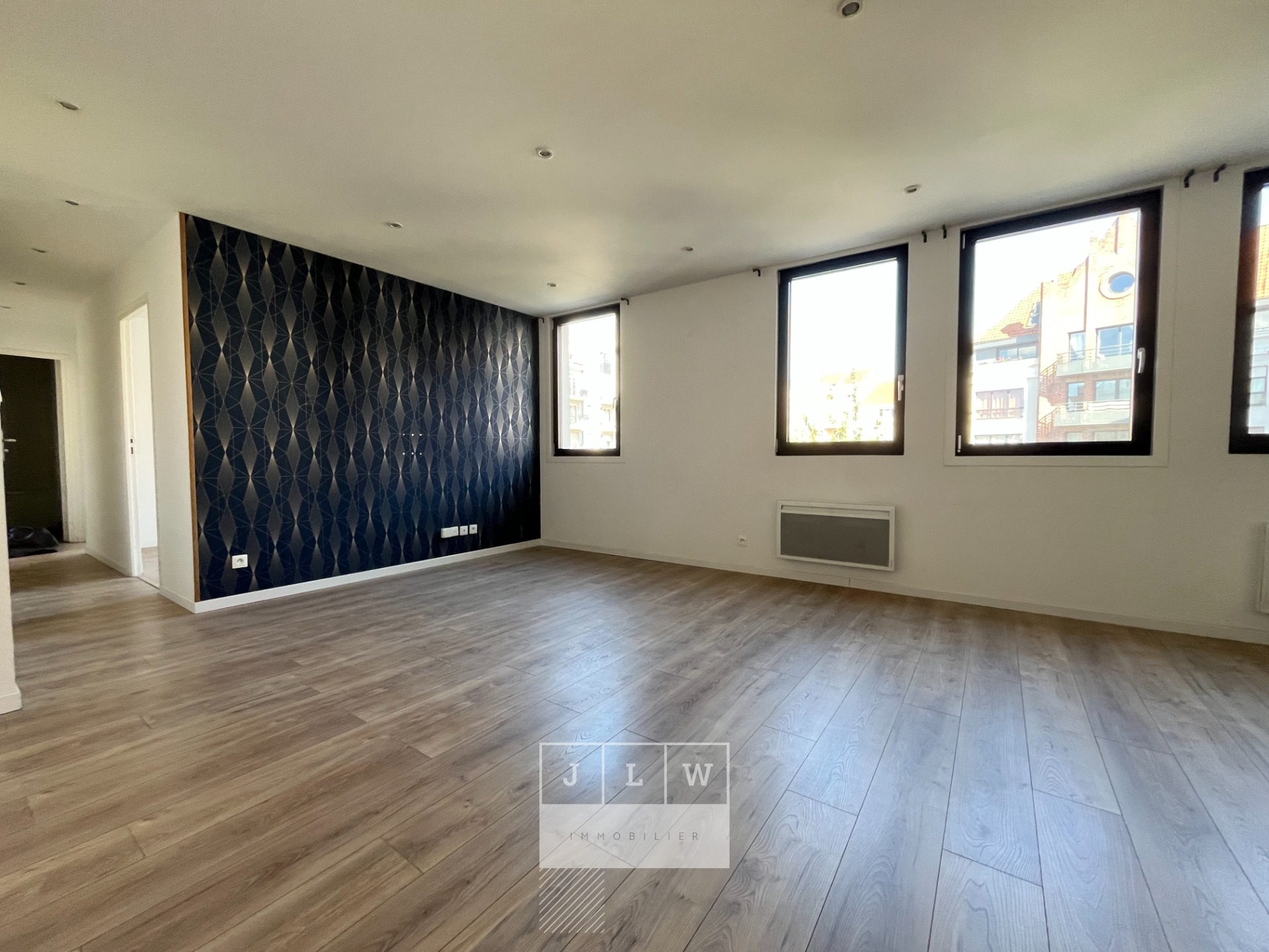 Appartement renove avec cave et parking Photo 2 - JLW Immobilier