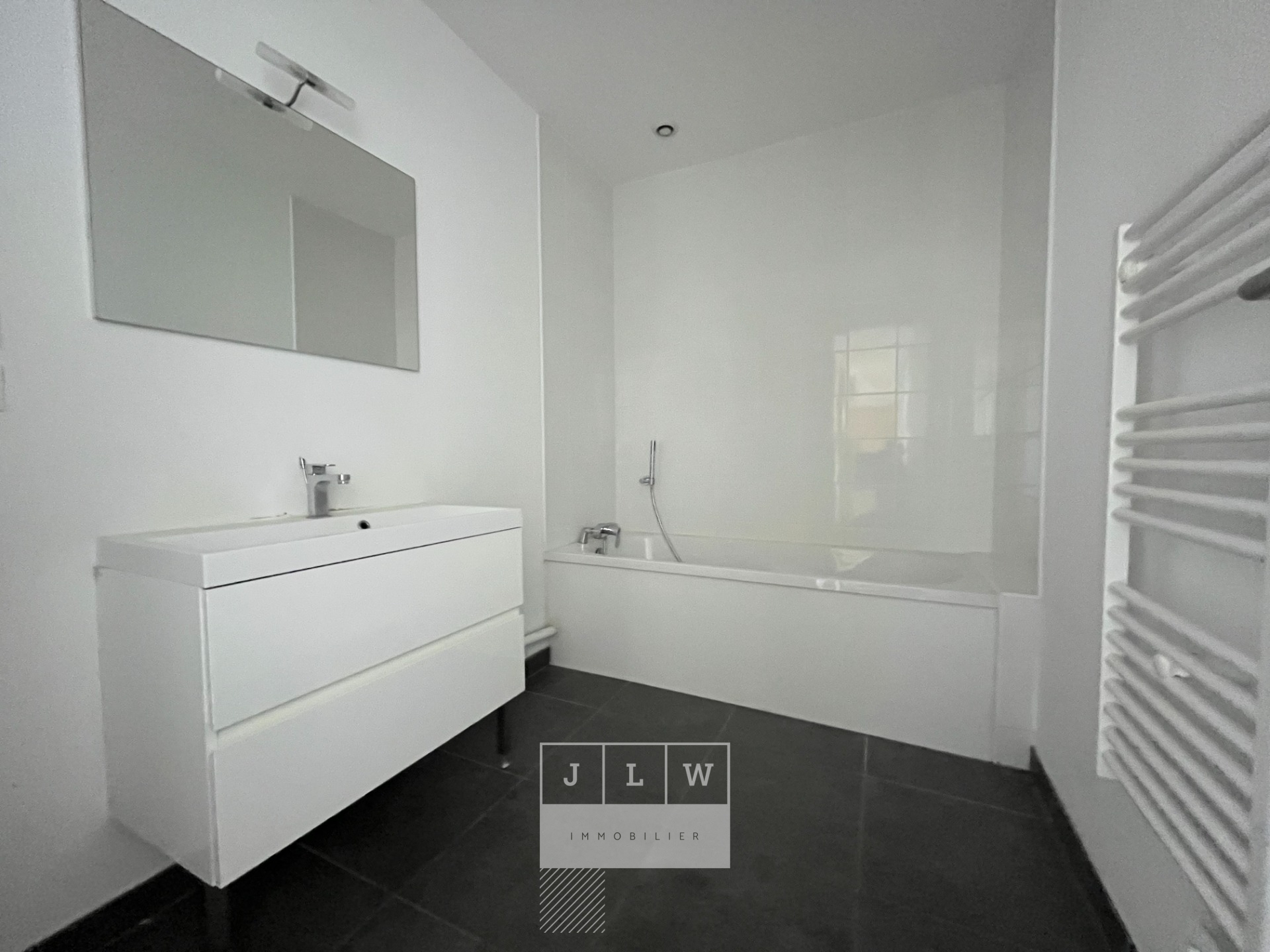 Appartement renove avec cave et parking Photo 6 - JLW Immobilier