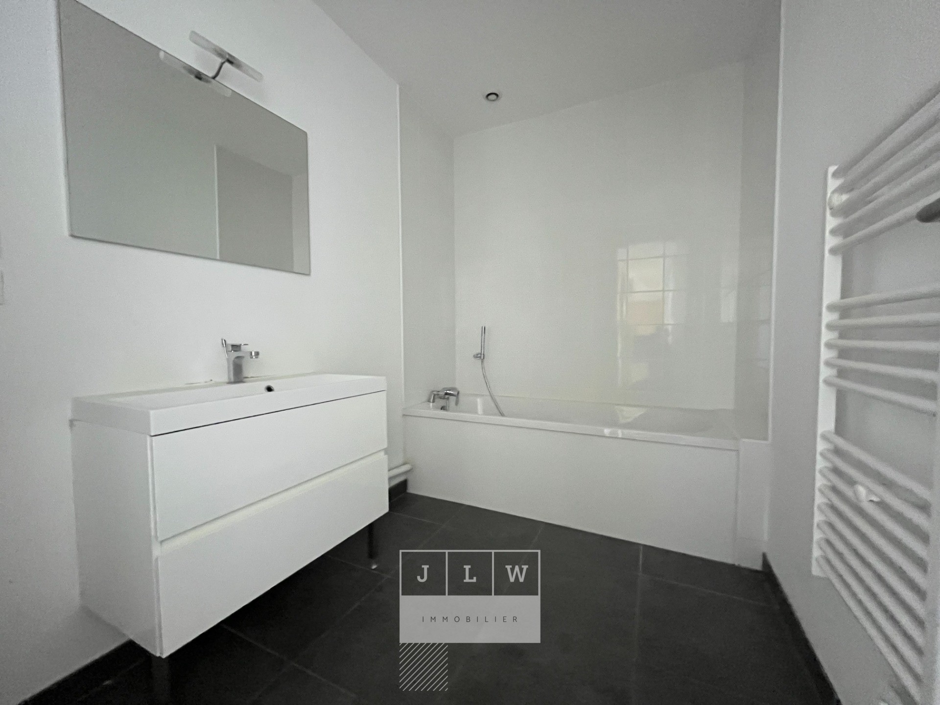 Appartement renove avec cave et parking Photo 7 - JLW Immobilier