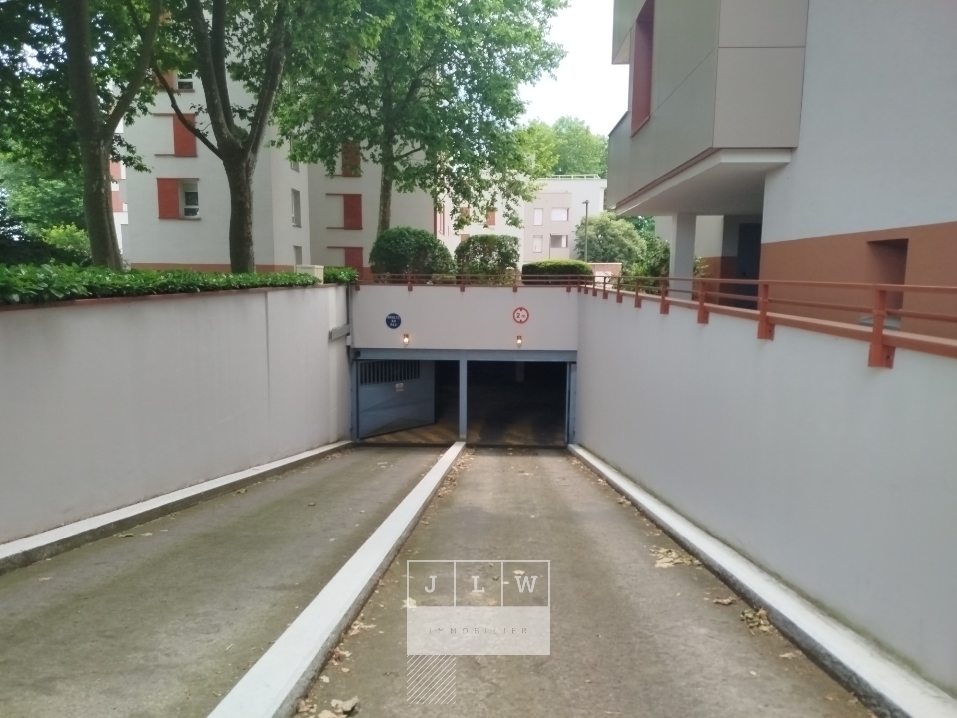 Asml pkg garage ferme sous sol Photo 1 - JLW Immobilier Asml pkg garage ferme sous sol Photo 1 - JLW Immobilier