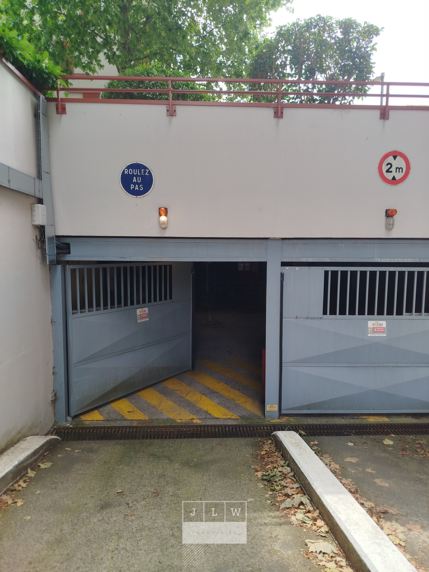 Asml pkg garage ferme sous sol Photo 2 - JLW Immobilier Asml pkg garage ferme sous sol Photo 2 - JLW Immobilier