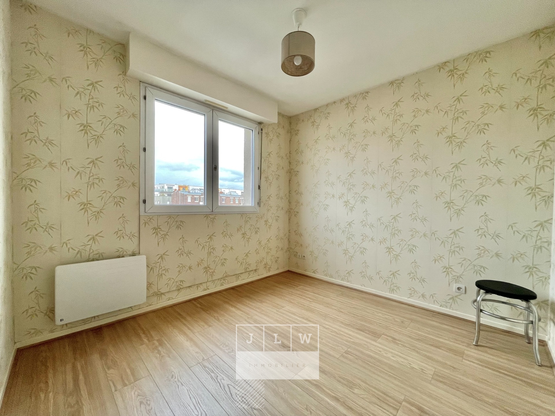 T2 avec balcon et place de parking  quelques pas du tram  Photo 7 - JLW Immobilier