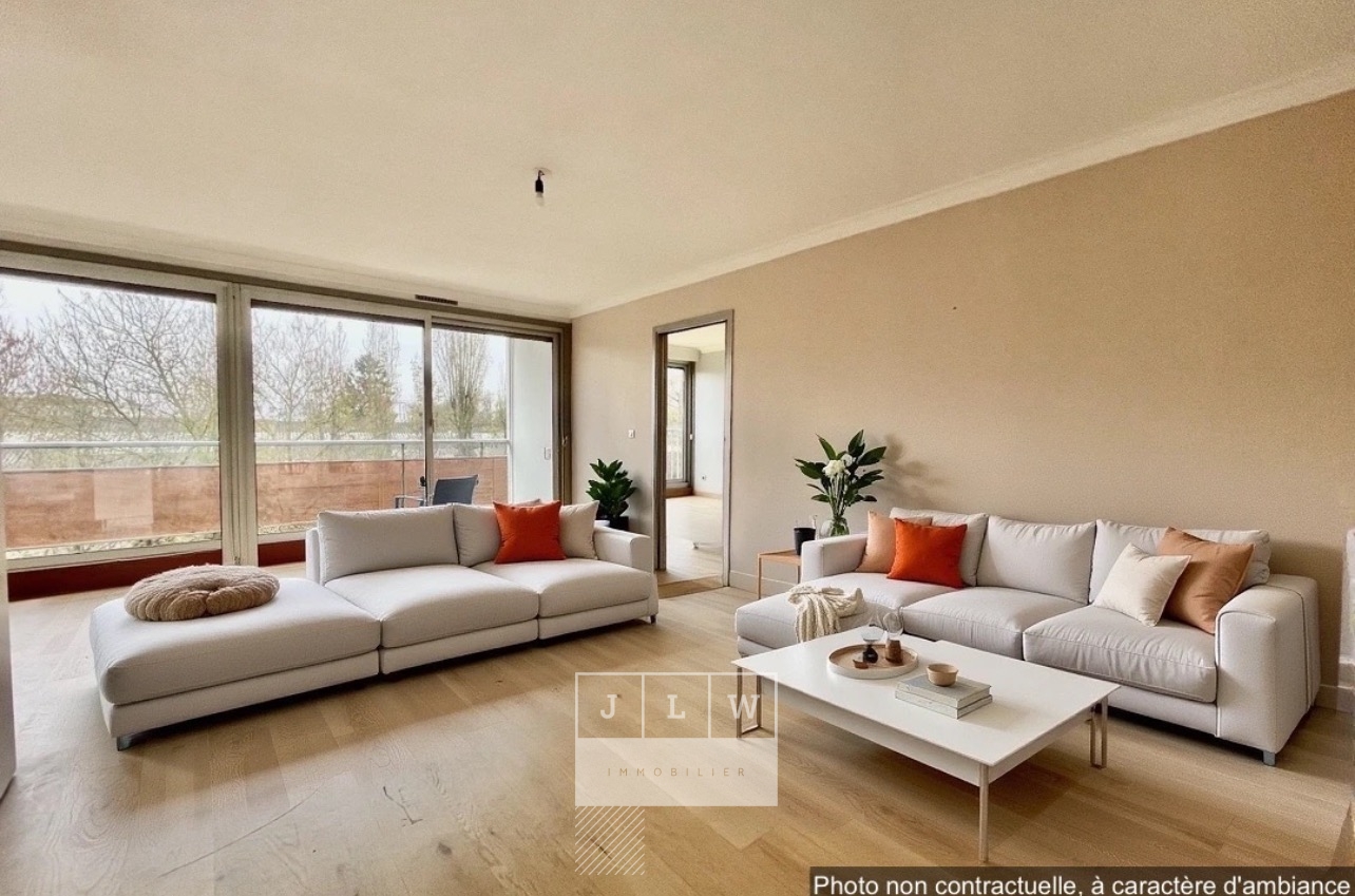 Bel appartement lumineux avec balcon cave et garage Photo 1 - JLW Immobilier