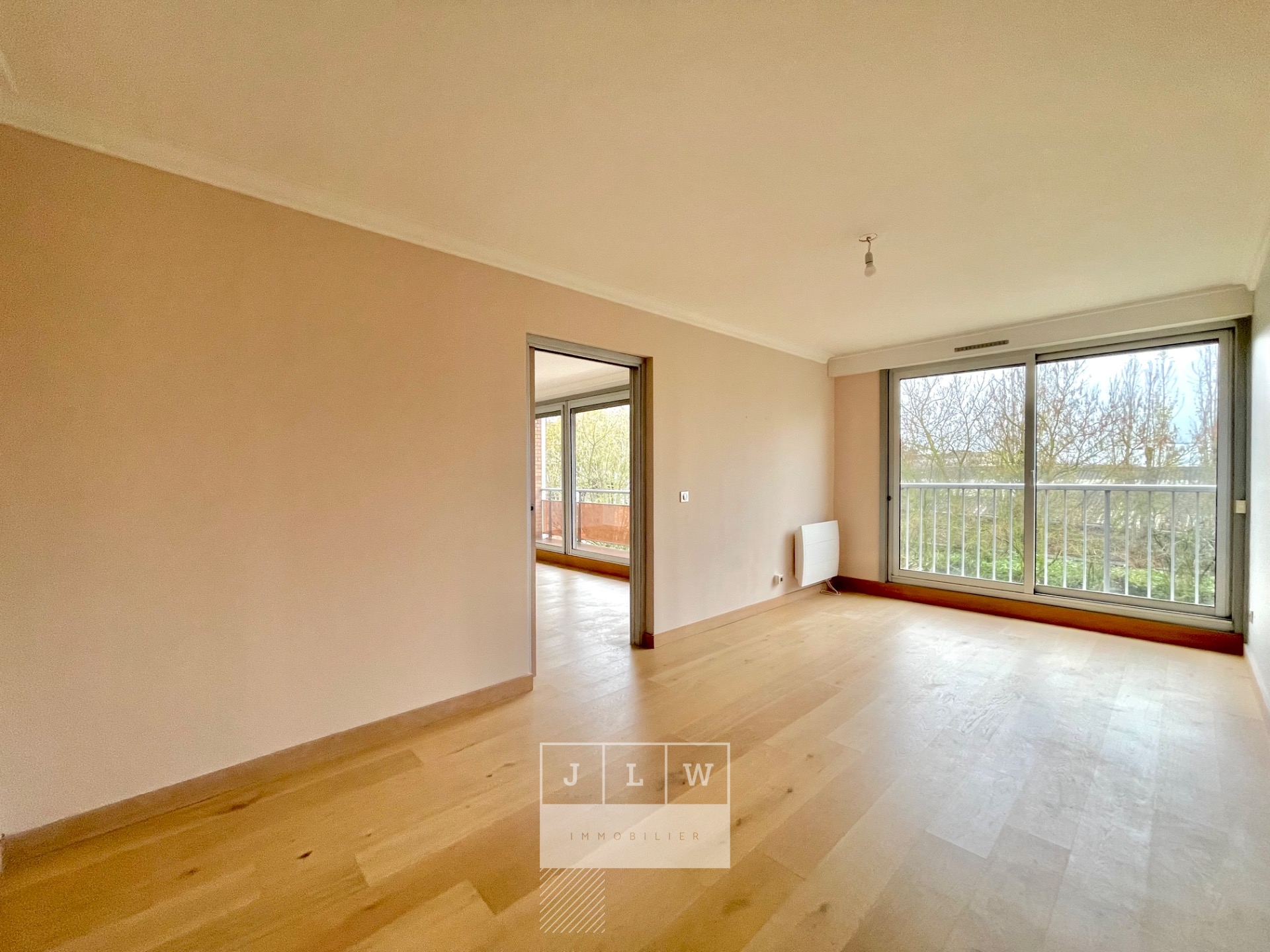 Bel appartement lumineux avec balcon cave et garage Photo 6 - JLW Immobilier