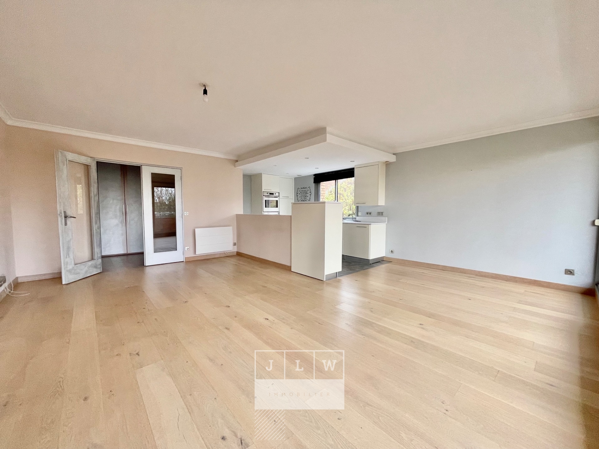 Bel appartement lumineux avec balcon cave et garage Photo 12 - JLW Immobilier