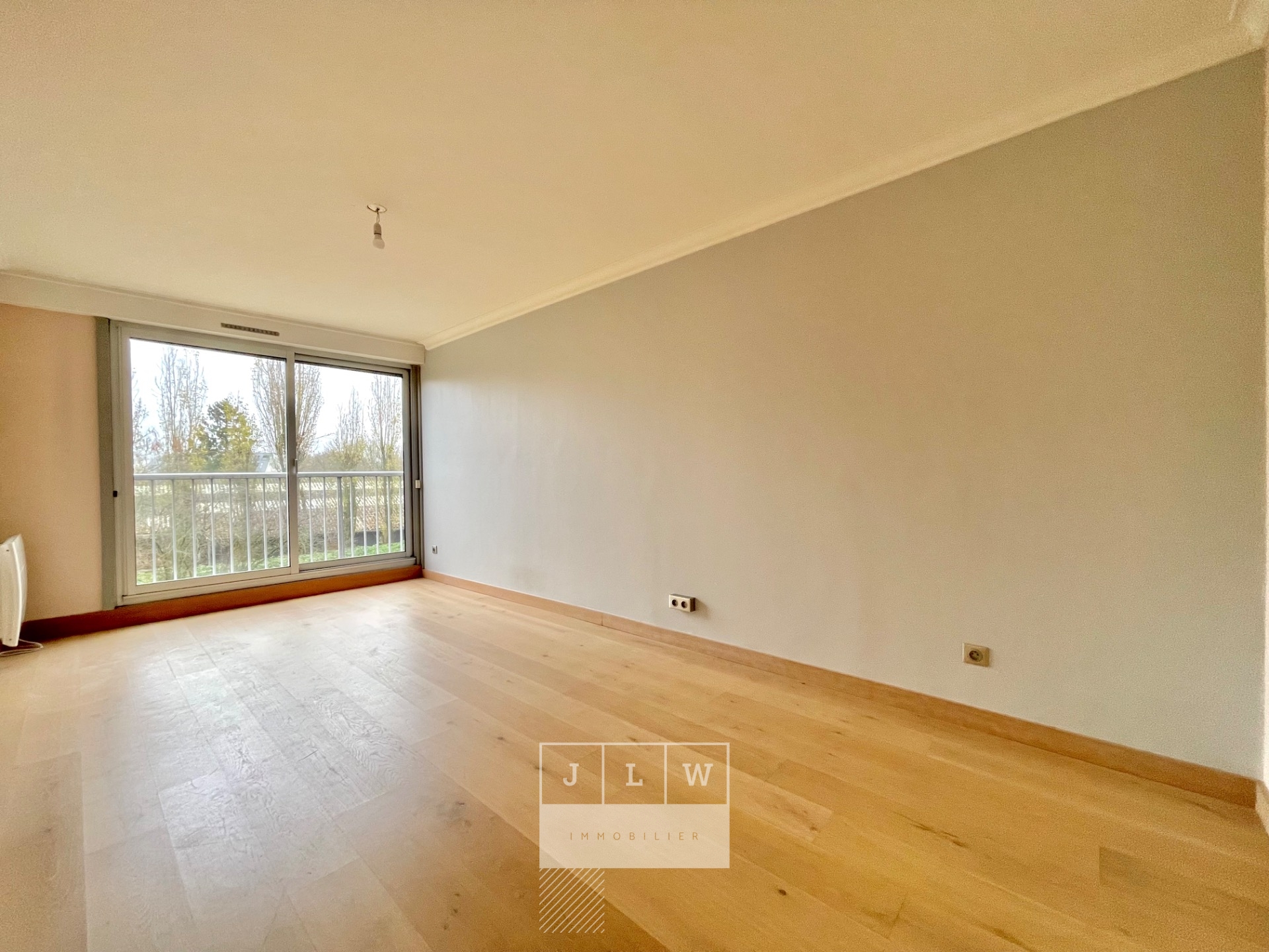 Bel appartement lumineux avec balcon cave et garage Photo 13 - JLW Immobilier