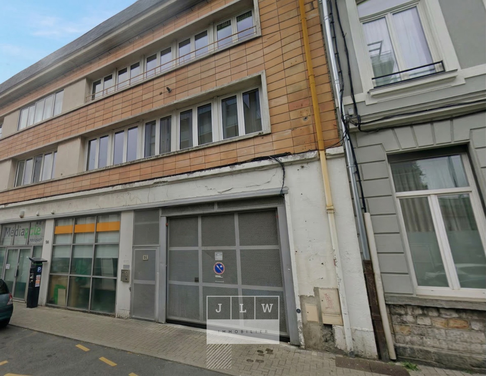Athn sd65 place de parking securisee rue de douai Photo 2 - JLW Immobilier Athn sd65 place de parking securisee rue de douai Photo 2 - JLW Immobilier