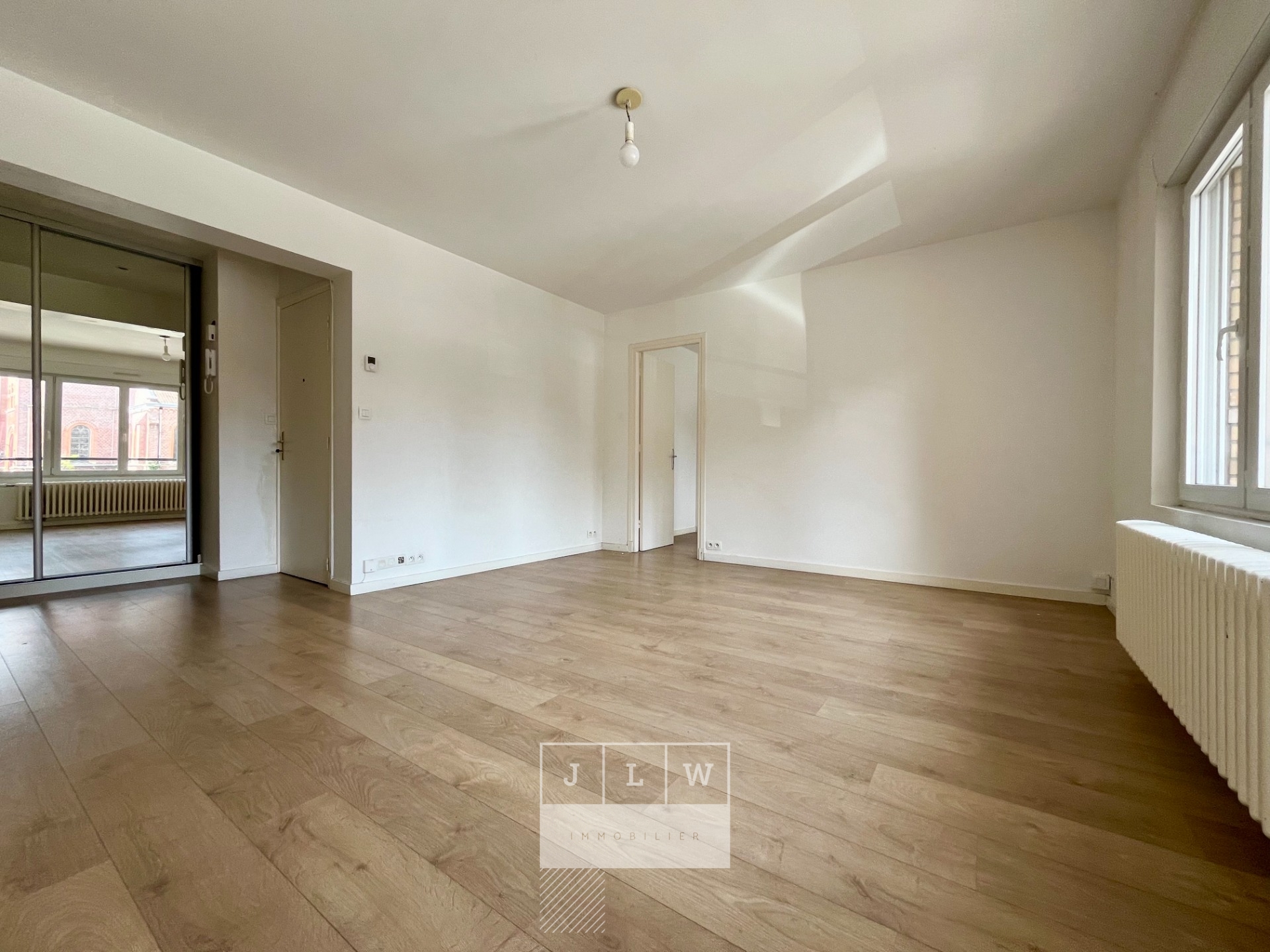 Appartement renove t4 avec garage et balcon Photo 1 - JLW Immobilier