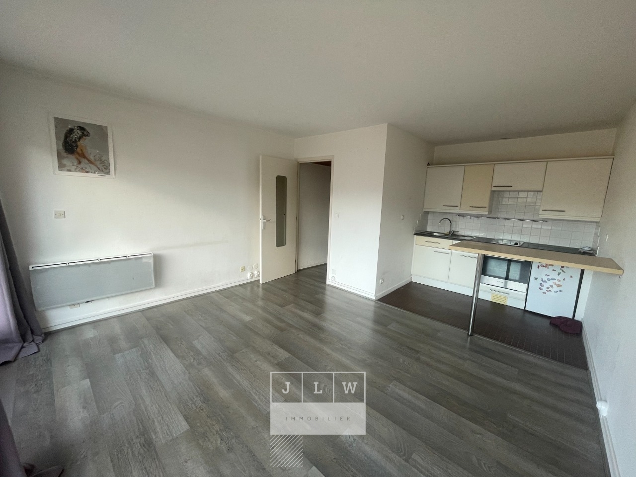 Irw ll152 appartement t1 non meuble avec garage  Photo 1 - JLW Immobilier